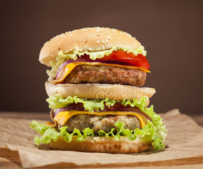 Fresh burger on wooden background