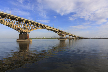 Fototapeta na wymiar Saratov Bridge crosses the Volga River and connects Saratov and Engels, Russia (length is 2,803.7 meters)