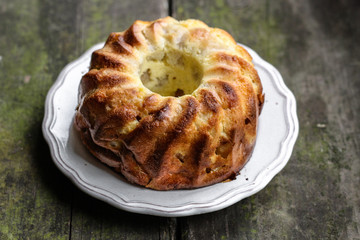Pie with fruit (on a wooden surface)