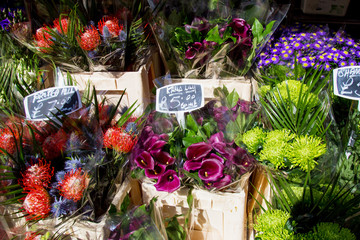Colorful variety of flowers sold in the market - 140663965