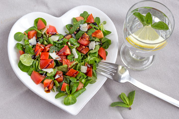 simple, fresh and delicious salad on heart shaped plate
