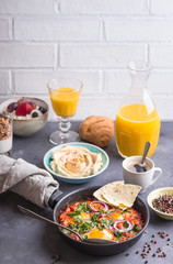 Breakfast with middle eastern and european food.