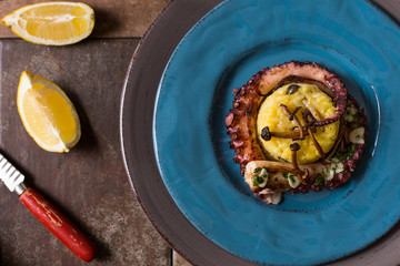 Grilled Seafood Octopus on Saffron Risotto with Brown Shimeji Mushrooms