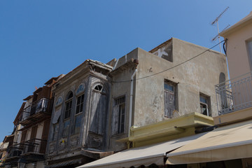Fototapeta na wymiar Rethymno, Greece - August 3, 2016: Building in old town.