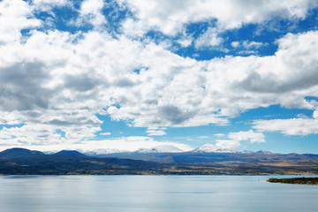 Sevan lake and white clouds blue sky on a sunny day, Armenia