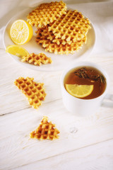 Tea with lemon and wafer