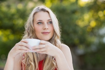 Beautiful woman having coffee cup