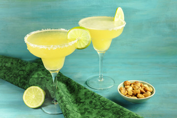 Lemon Margarita cocktails with  limes and copy space
