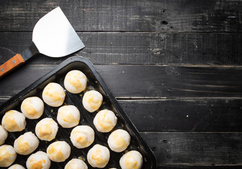 Egg yolk shortcake on a tray over wooden background,Chinese delicious dessert