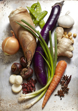 Raw fesh vegetables on a tray.