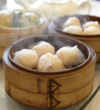 Steaming Shrimp Dumplings In A Bamboo Dim Sum Holder.