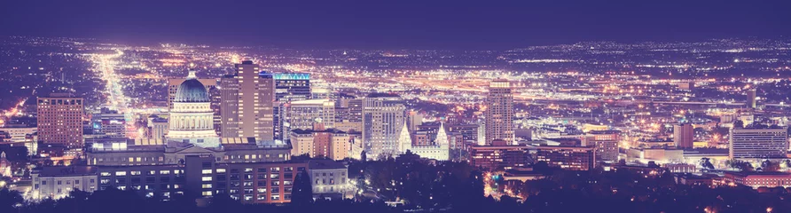 Fototapeten Vintage toned Salt Lake City downtown night panorama, Utah, USA.  © MaciejBledowski