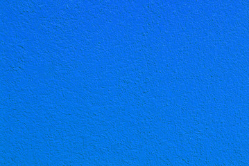 Fototapeta na wymiar Textured blue stucco wall. Material design background