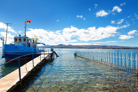 Sevan lake and white clouds blue sky on a sunny day, Armenia