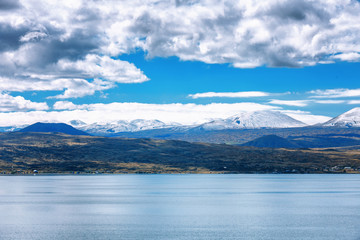 Sevan lake and white clouds blue sky on a sunny day, Armenia