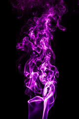 Purple smoke on a black background