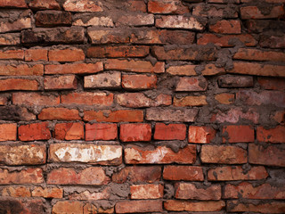 Old red brick wall textured wallpaper background