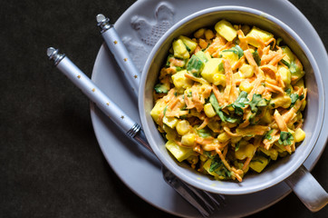 Vegetarian salad of apple and coriander carrot and avocado