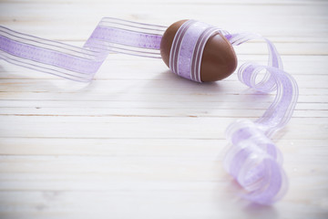 Chocolate Easter Eggs Over Wooden Background