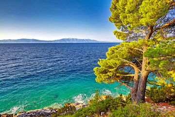 Fantastic views of the adriatic sea under sunlight and blue sky.