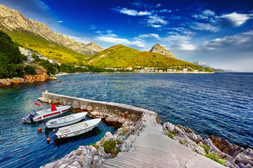 Fantastic views of the adriatic sea under sunlight and blue sky.