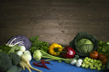 Healthy food, Fresh vegetables on the wooden surface, place for typography