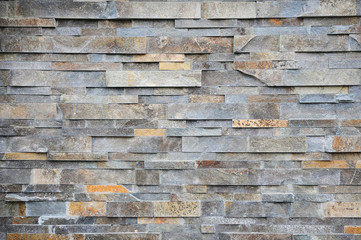 Stone wall texture background natural color.