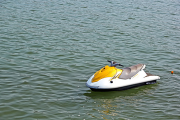 Sea scooter anchored in the bay at Dona Paula in Goa, India, waiting for tourists