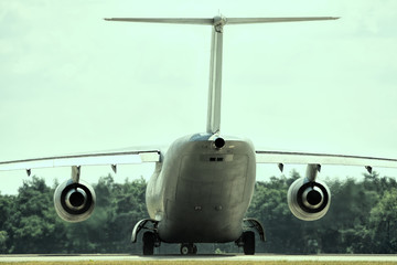 High wing T-tail aircraft preparing for take off