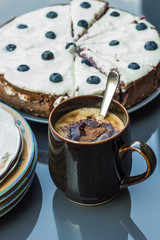 delicious coffee,.Cheesecake with blueberries,