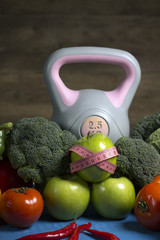 Healthy lifestyle concept. Workout and fitness dieting, Vegetables, dumbbells