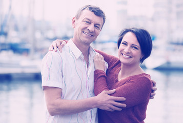 couple hugging outdoors at spring day