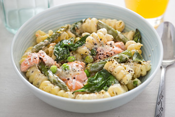 Salmon asparagus primavera with spinach and green asparagus