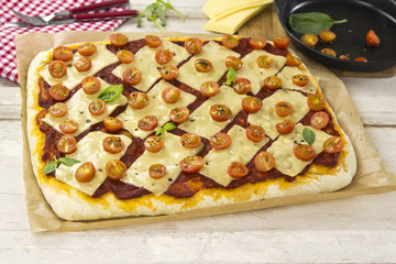 Margarita pizza on wooden table