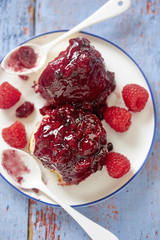 Pudding with berry sauce