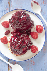 Pudding with berry sauce