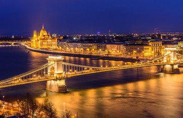 Fototapeta na wymiar Aerial view of Budapest at night. Hungarian landmarks: Chain Bridge, Parliament and Danube river in Budapest.