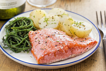 Salmon steak with baby potatoes