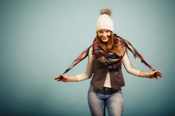 Cute young woman wearing cap.
