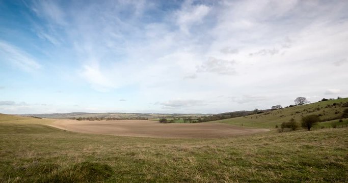 Sunlight over the fallow Chilterns, England; time lapse