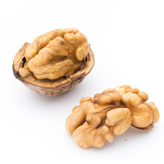 Walnut and walnut kernel isolated on the white background.