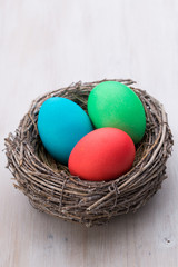 Easter eggs in the nest. Spring discount card.