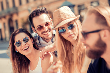 Friends having fun in the city