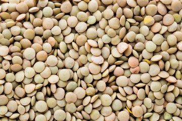Lentils pulse legumes vegetables vegetarian food background.