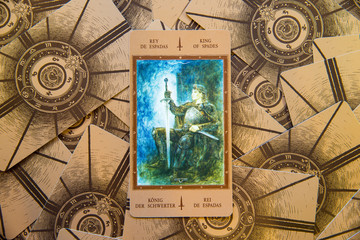 Fototapeta na wymiar Tarot card King of Spades. Labirinth tarot deck. Esoteric background.