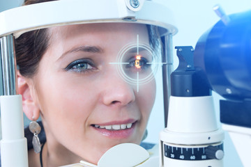 Checking eyesight in a clinic of the future, young girl. Ophthalmology. Future medicine and health...
