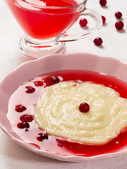 Semolina pudding with cranberry jelly (sauce)