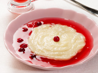 Semolina pudding with cranberry jelly (sauce)