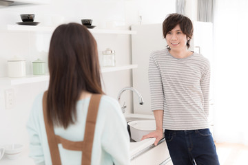 young asian couple in modern kitchen