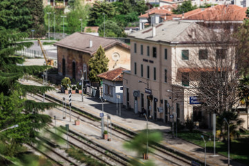 Fototapeta na wymiar Tilt-shift panorama of the railway station of Vittorio Veneto